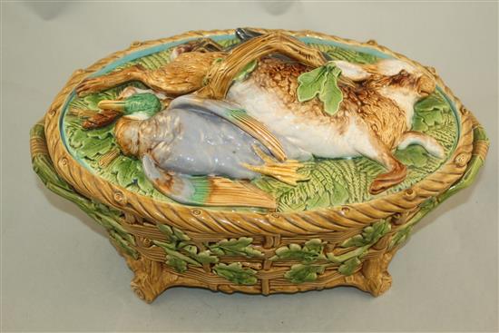 A Minton majolica game pie dish and cover, date code for 1861, 37cm